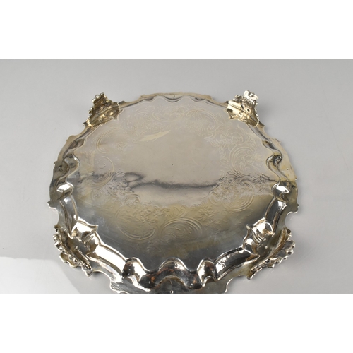 191 - A Victorian Silver Salver by Smith, Nicholson & Co., with Scrolled Shell Relief Trim and Raised on C... 