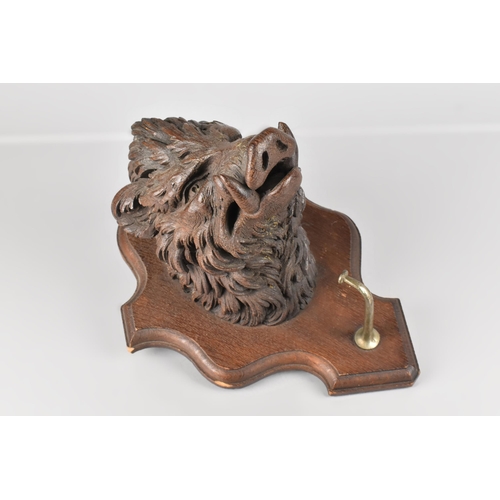 146 - A Late 19th Century/Early 20th Century Carved Wooden Wall Mounting Black Forest Boar's Head on Shiel... 