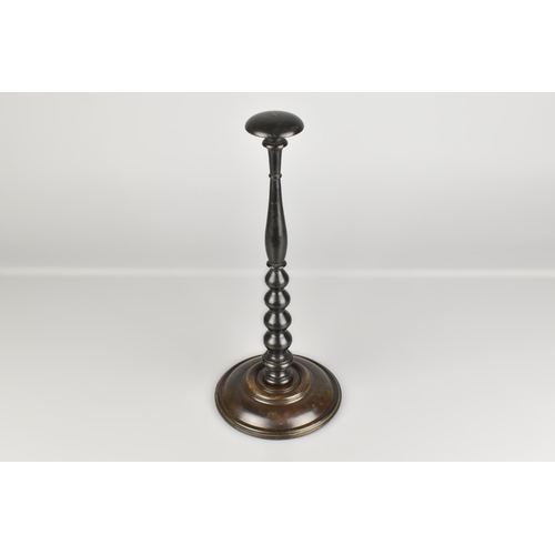 93 - A Late 19th/Early 20th Century Wig Stand with Turned Bobbin Support on Circular Base, 32cm high