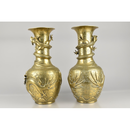 248 - A Large Pair of Heavy Chinese Brass Dragon Vases of Baluster Form with Flared Neck Decorated in Reli... 