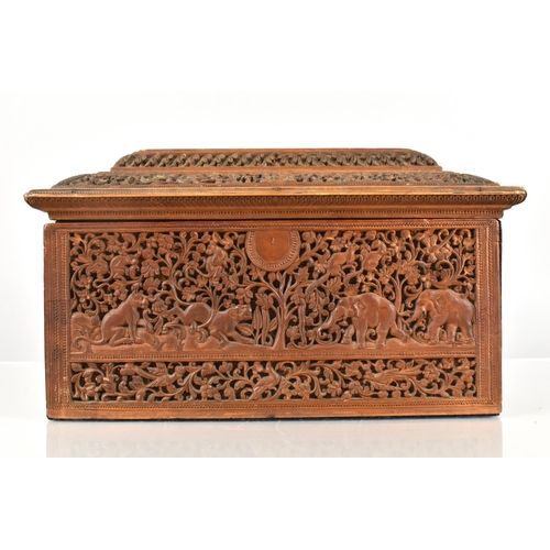 96 - A Late 19th/Early 20th Century Anglo-Indian Sandalwood Box of Sarcophagus Form, Profusely Carved wit... 