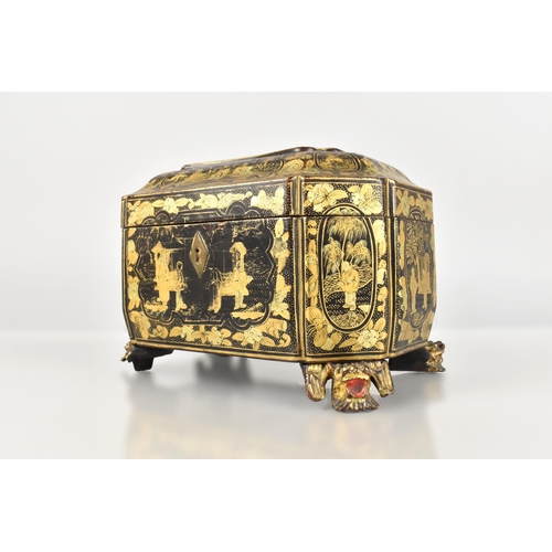 246 - A Chinese Qing Dynasty Export Lacquer Tea Caddy, 19th Century, of Sarcophagus Form Decorated in Gilt... 