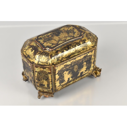 246 - A Chinese Qing Dynasty Export Lacquer Tea Caddy, 19th Century, of Sarcophagus Form Decorated in Gilt... 