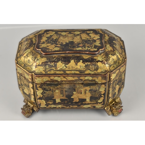 246 - A Chinese Qing Dynasty Export Lacquer Tea Caddy, 19th Century, of Sarcophagus Form Decorated in Gilt... 