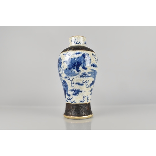 243 - A Chinese Nanking Crackle Glazed Blue and White Vase Decorated with Temple Lions and Oxidised Trim, ... 