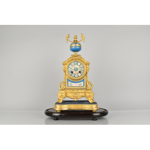 176 - An Early 20th Century Ornate Gilt Metal Mantel Clock with Sevres Style Porcelain Panel, Dial and Fin... 