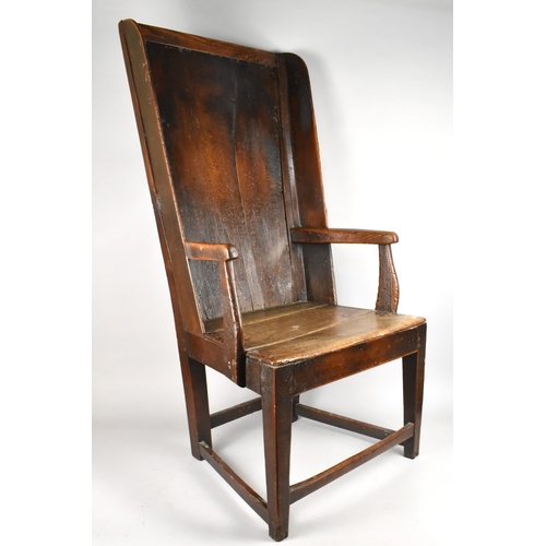 367 - An 18th/19th Century English Elm Lambing Chair with Winged Back, Three Panel Seat, Shaped Arms and S... 