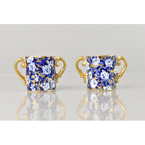 262 - A Pair of Late 19th/Early 20th Century Miniature Loving Mugs with Hand Painted Oval Landscape Cartou... 