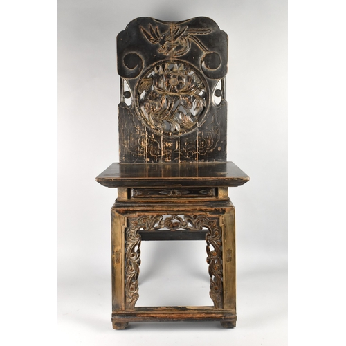 238 - A 19th Century Chinese Painted Elm Side Chair with a Carved and Pierced Back Above a Solid Seat, Sup... 