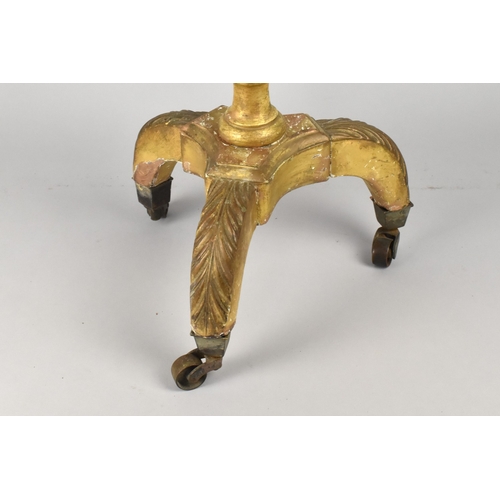 136 - A Late 18th Century Carved and Giltwood Torchere with a Circular Dished Top Over a Reeded Column, Su... 