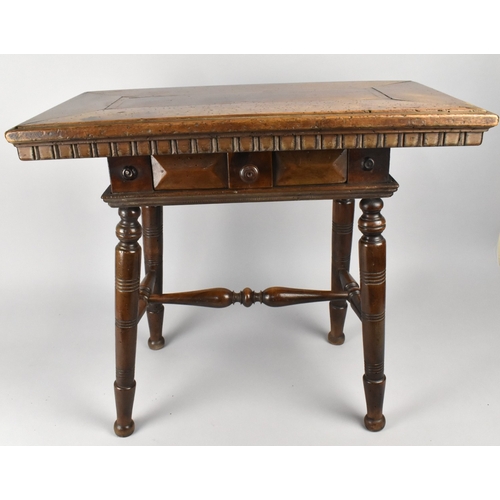 99 - A 19th Century Spanish Walnut Low Side Table with a Panelled Top Over a Single Drawer Supported on T... 