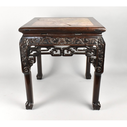 242 - A 19th Century Chinese Urn Stand/Low Table with a Marble Top Over Carved and Pierced Side Rails Supp... 