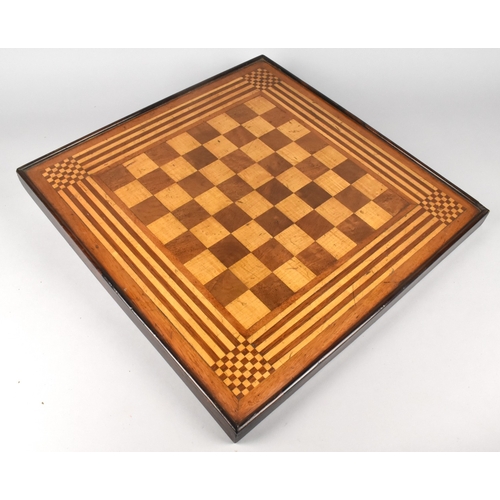 110 - A 19th Century Mahogany and Satinwood Double Sided Games Board, One Side Chess and the Other Side Pa... 