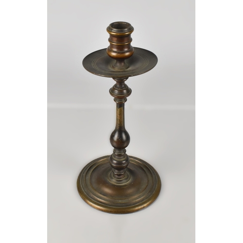 156 - An Early 19th Century Continental Bronze Candlestick, 30cm high