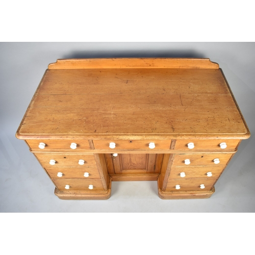 108 - A Victorian Galleried Kneehole Pine Desk with Centre Drawer over Central Cupboard and Four Drawers E... 