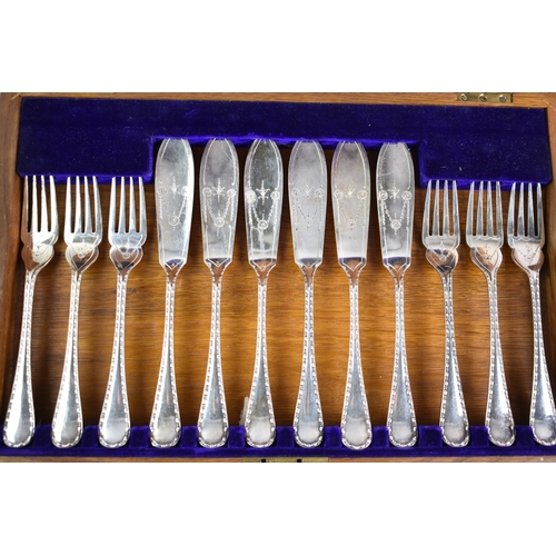 118 - An Edwardian Cased Set of Six Fish Knives and Forks by James Deakin and Sons