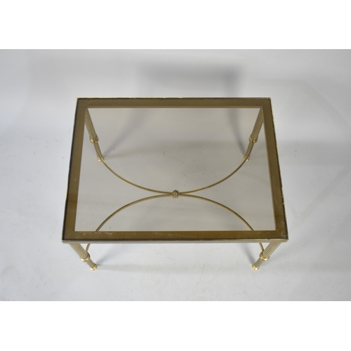 128 - A Late 20th Century Brass Based Smoked Glass Occasional Coffee Table, 61cms Wide and 40cms High