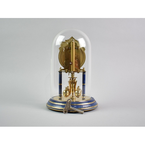 146 - A Mid 20th Century Blue Enamel and Gilt Pillar Clock by Kieninger and Obergfell with Glass Dome