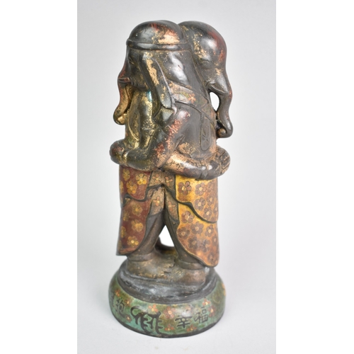 158 - An Enamelled Indian Bronze Study of Two Figures with Elephant Heads Embracing, 23cms High