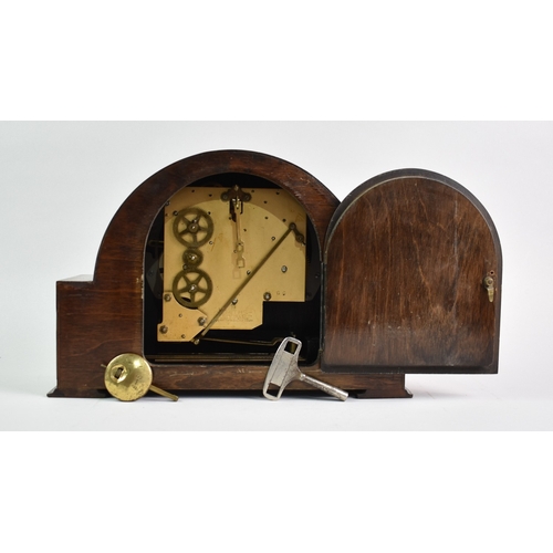 160 - An Art Deco Oak Cased Westminster Chime Mantel Clock by Smiths, With Key and Working Order