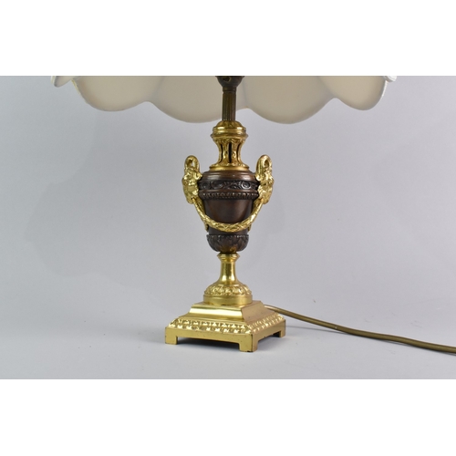 186 - A Modern Bronze and Gilt Brass Table Lamp and Shade with Rams Head Mounts in the French Second Empir... 