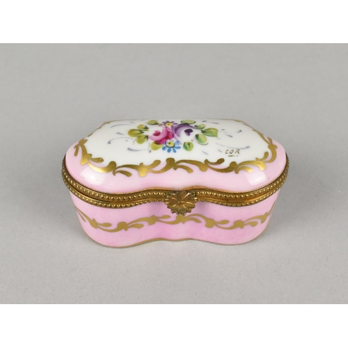 20 - A Limoges Ormolu Mounted Decorated Serpentine Front Porcelain Box, 7.5cms Wide