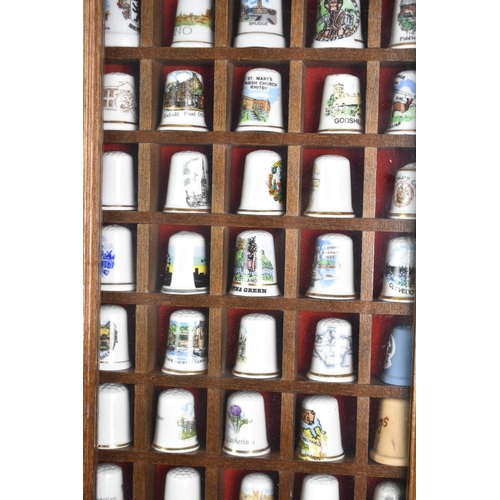 210 - A Collection of Modern Souvenir Collectors Thimbles with Displays