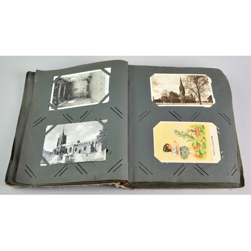 53 - An Early 20th Century Postcard Album Containing Mixed Cards, Coloured and Monochrome