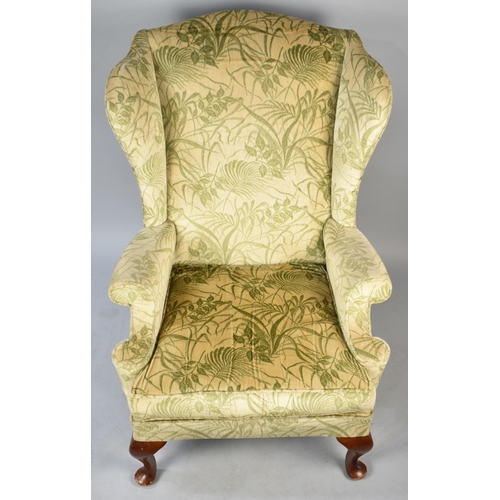 580 - A Parker Knoll Wing Armchair