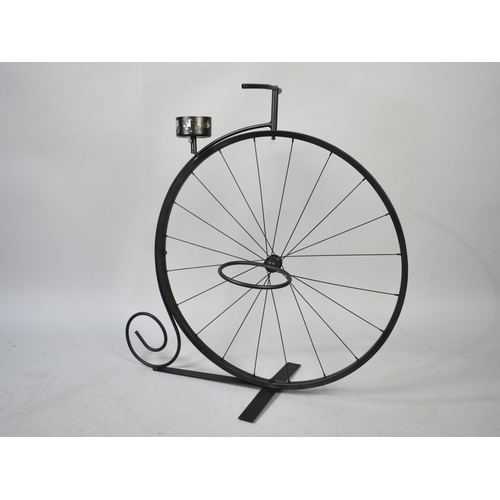 603 - A Novelty Plant Pot Holder in the Form of a Penny Farthing, 78cms High