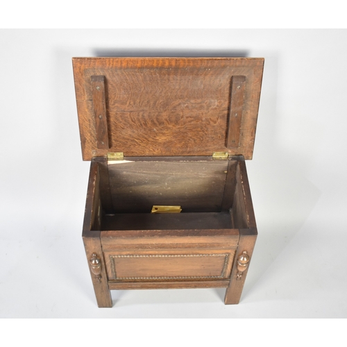 63 - A Mid 20th Century Oak Lift Top Sewing Box, 54cms Wide and 44.5cms High