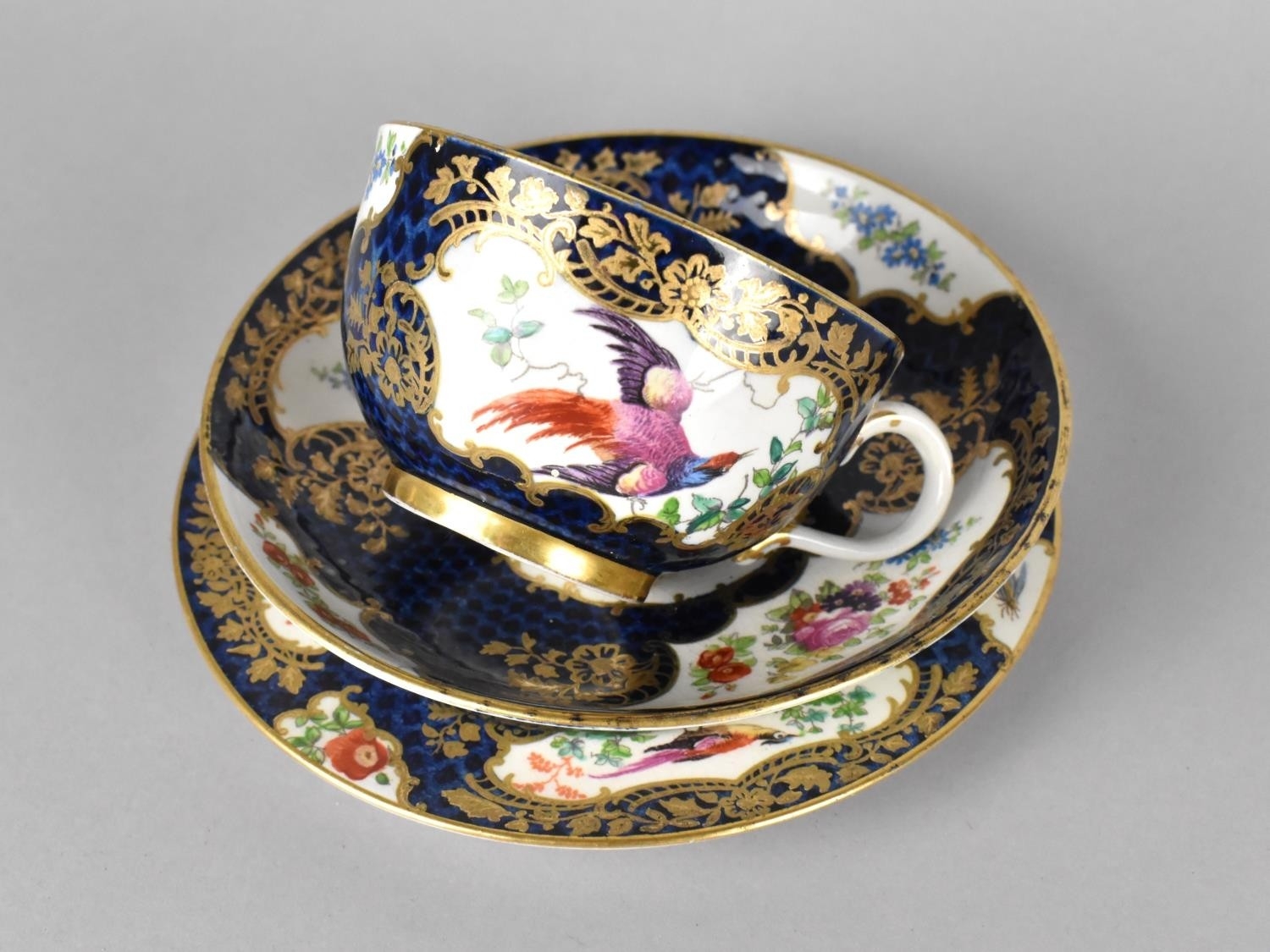 An 18th/19th Century Worcester Type Tea Trio to comprise Cup