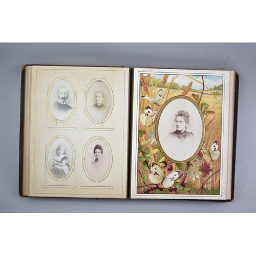 61 - A Late Victorian Photograph Album Containing Various Family Portraits, Monogrammed CAW, Some Conditi... 