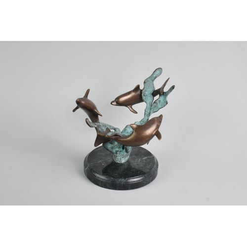 71 - A Contemporary Patinated Bronze Study of Three Dolphins Swimming Amongst Seaweed, Polished Marble Ba... 