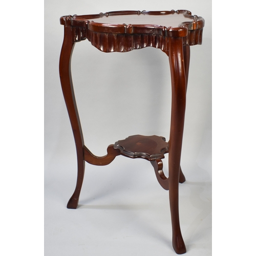 72 - A Reproduction Mahogany Corner Stand with Moulded Galleried Top and Shaped Stretcher Shelf, Cabriole... 