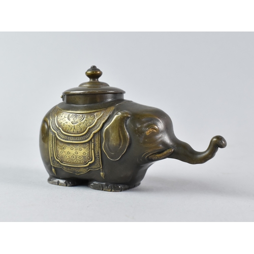 A Small Bronze Novelty Inkwell in the Form of an Indian Elephant, having Gilt and Patinated Decoration, 9cms Long