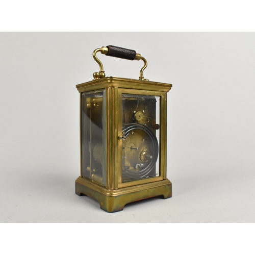 41 - An Edwardian French Brass Cased Carriage Clock Retailed by Finnigans, Movement In Need of Minor Atte... 