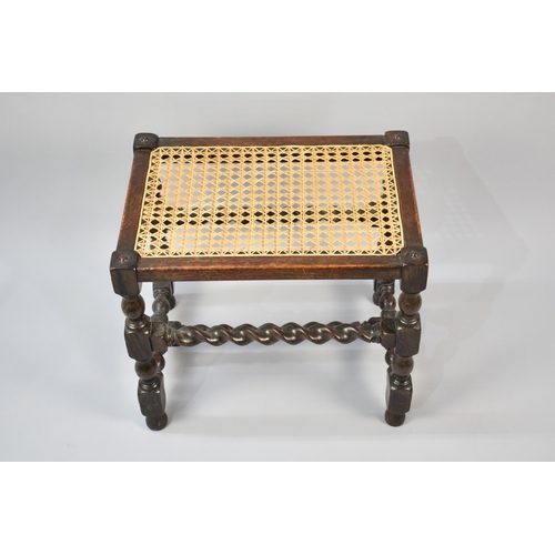 30 - An Edwardian Oak Framed Barley Twist Cane Seated Stool, 50cms Wide and 43cms High