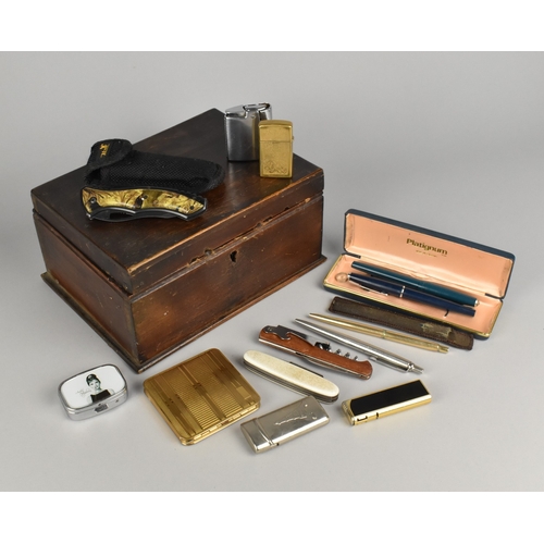 62 - An Edwardian Wooden Box Containing Pocket Knives, Multi Tool Knife, Cigarette Lighters Cigarette Cas... 