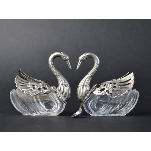 1 - A Pair of White Metal and Glass Novelty Salts in the Form of Swans Together with a Silver Salt Spoon
