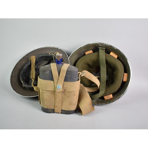 117 - Two Vintage Military Helmets and a Water Bottle with Canvas Strap