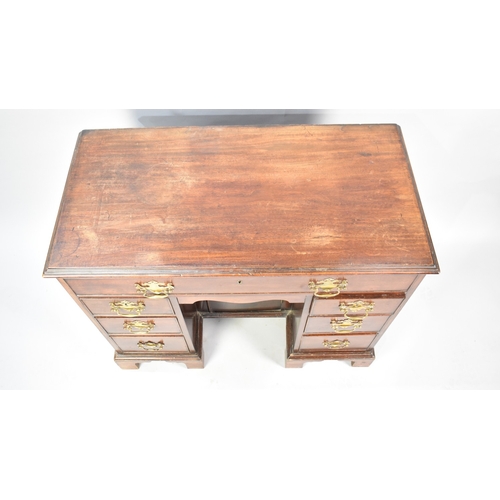 119 - A 19th Century Mahogany Kneehole Writing Desk with Brass Drop Handles to Single Long Top Drawer and ... 