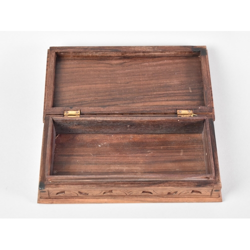 122 - A Carved Far Eastern Teak Box, Hinged Lid Decorated with Bird, 20cms Wide