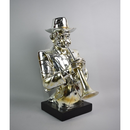 147 - A Large Silvered Composition Study of Jazz Player with Trumpet, 46cms High