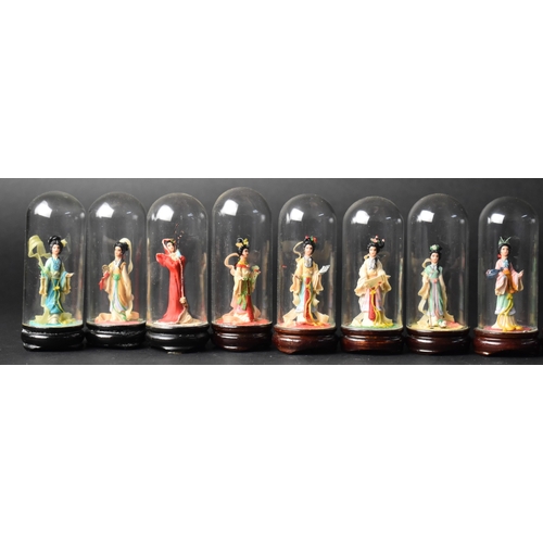 152 - A Collection of Various Mid 20th Century Souvenir Chinese Dolls Under Glass etc