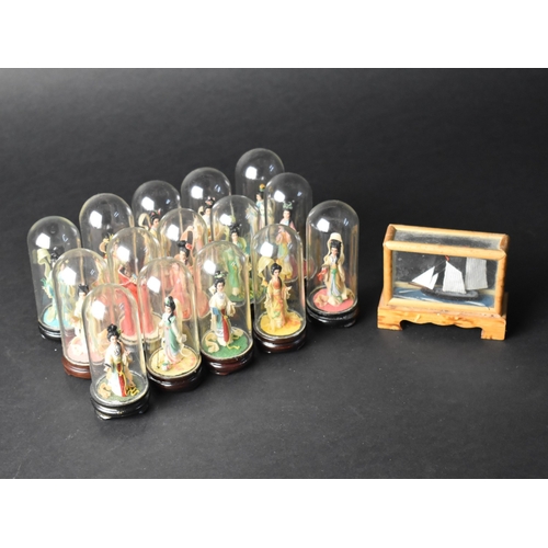 152 - A Collection of Various Mid 20th Century Souvenir Chinese Dolls Under Glass etc