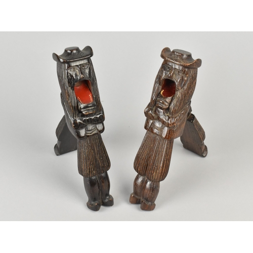 23 - A Pair of Early 20th Century Carved Wooden Nutcrackers in the Form of a Standing Men in Traditional ... 