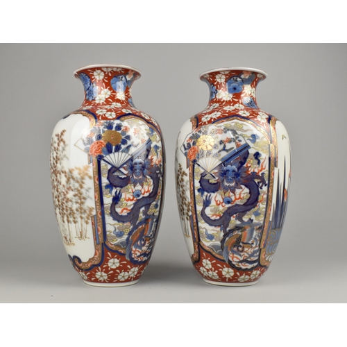253 - A Pair of Japanese Fukagawa Type Porcelain Imari Vases Decorated with Panels to Include Dragon, Foli... 