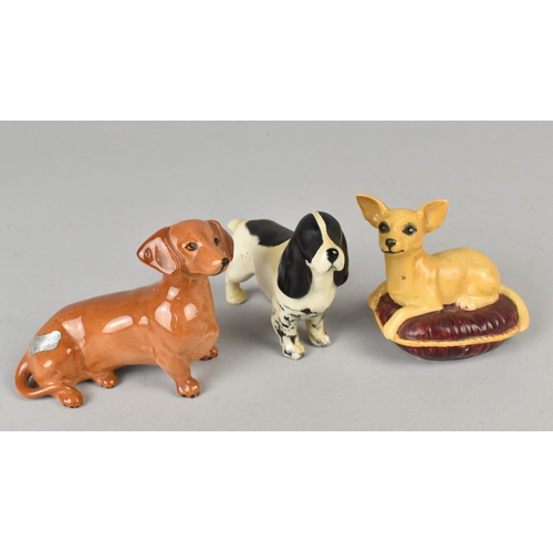 373 - A Beswick Chihuahua No.2454, Dachshund and Cocker Spaniel (AF)