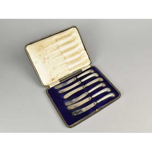 392 - A Cased Set of Six George V Sterling Silver Pistol Grip Butter Knives having Acanthus Moulded Termin... 